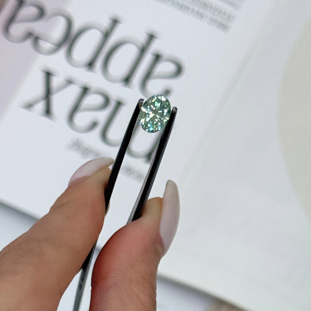 8x6mm ( DEW 1.5ct) oval aqua-teal moissanite