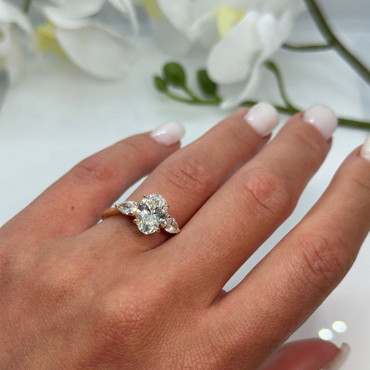 AGIDesignShop Laura Oval Moissanite and Pear Shape Lab Diamonds Engagement Ring