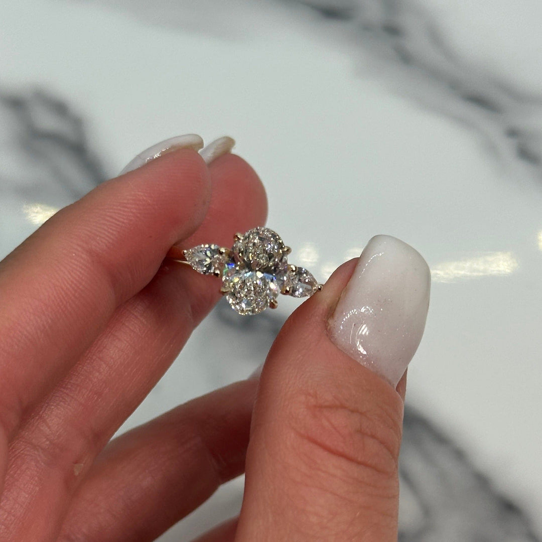 AGIDesignShop Laura Oval Moissanite and Pear Shape Lab Diamonds Engagement Ring