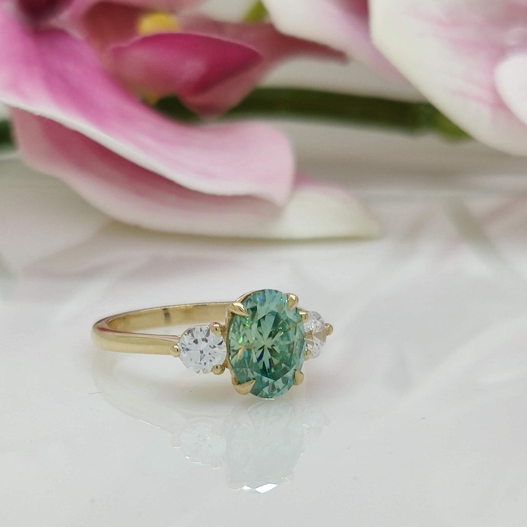 AGI Design Lucy Oval Aqua Teal  Moissanite with Round Lab Diamonds Engagement Ring