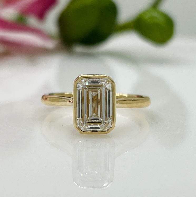 AGI Design Ray Radiant/Emerald Lab Created Diamond Bezel Engagement Ring