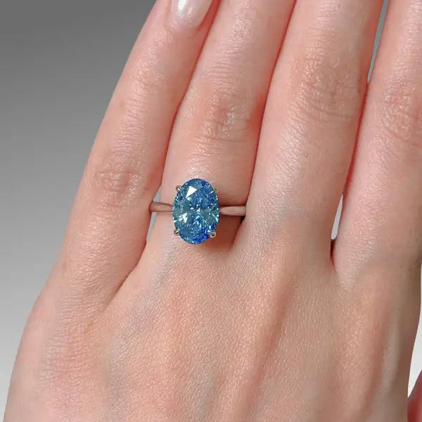 Bague de fiançailles en or blanc 14 carats avec diamant ovale bleu vif/VS1 de 3,01 ct