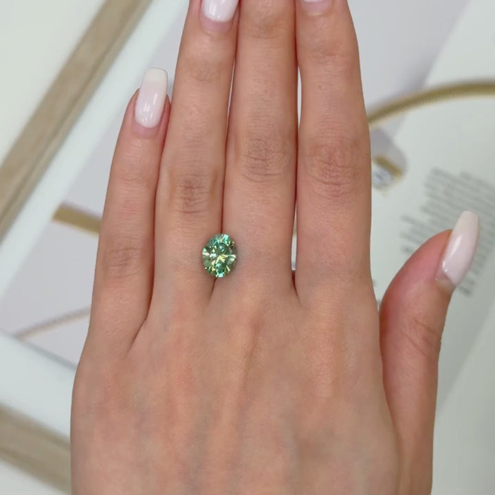 8x10mm ( DEW 3ct) oval aqua-teal moissanite