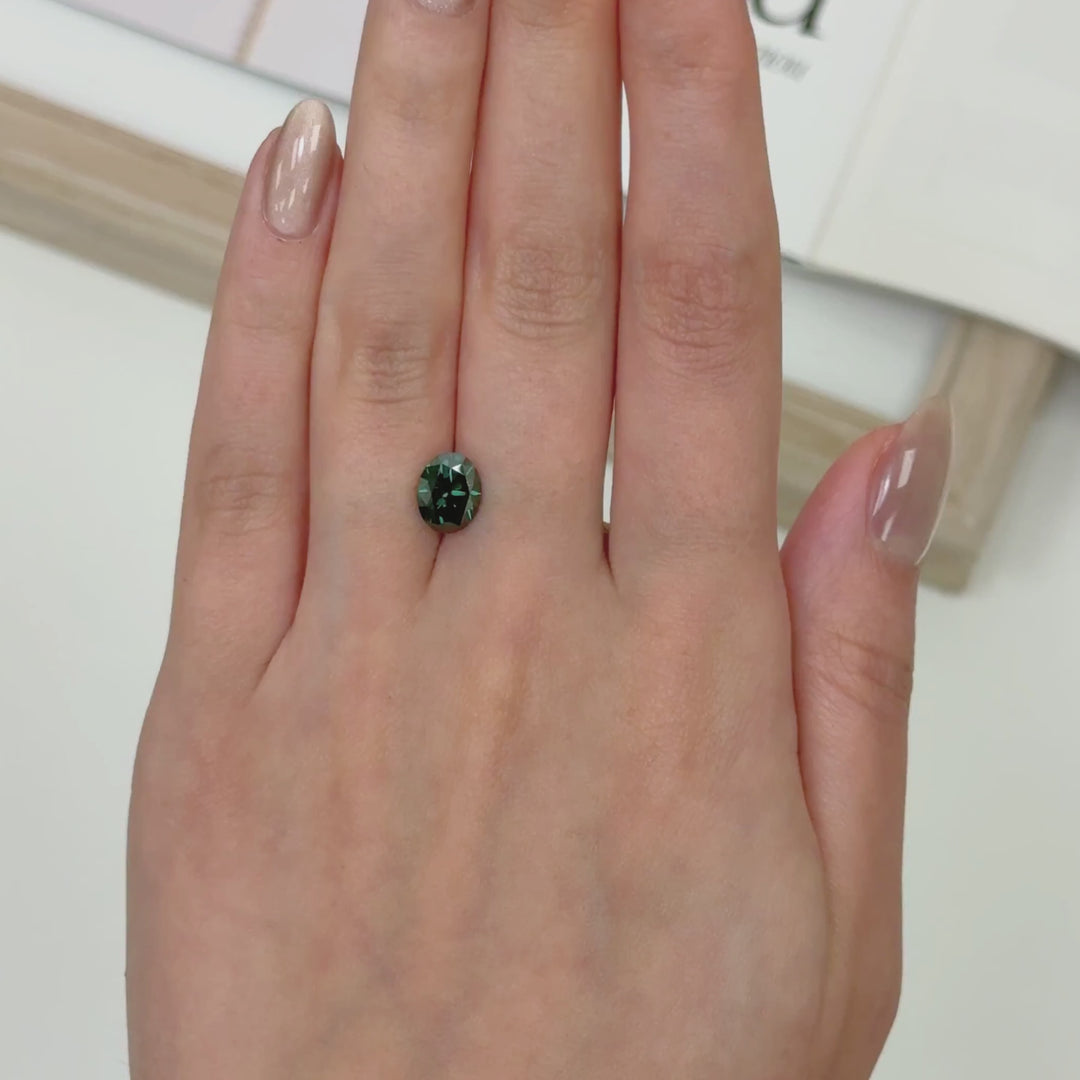 7x9mm ( DEW 2ct) oval green moissanite