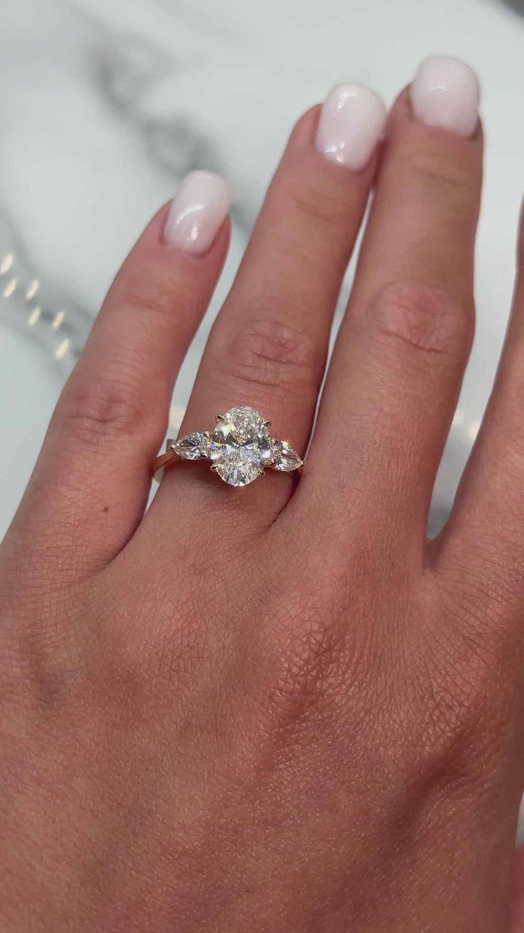 Laura Oval Moissanite and Pear Shape Lab Diamonds Engagement Ring