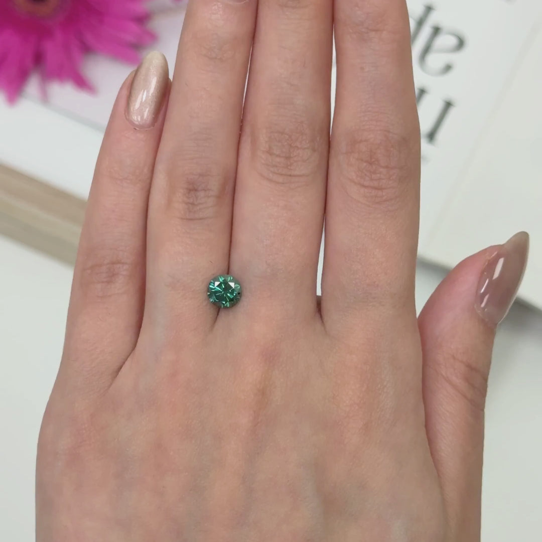 6.5mm ( DEW 1ct) round dark green moissanite
