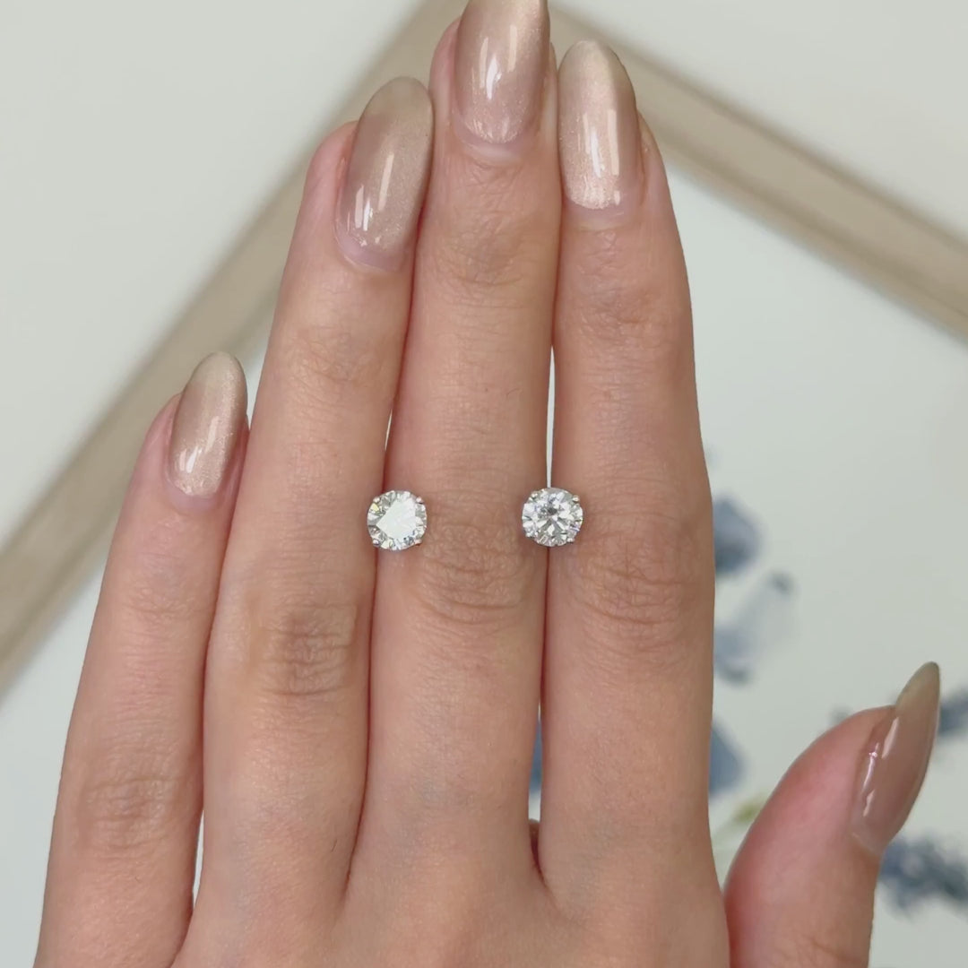 Round lab created diamond stud earrings