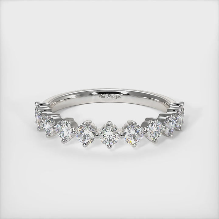 Delicately crafted in solid gold or platinum, this band is 3mm wide set with round brilliant cut Lab-created diamonds. This bridal ring can be made with moissanite./AGI Design