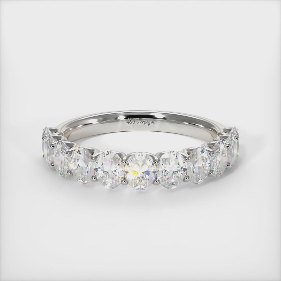 Celebrate the lasting tradition of marriage with a timeless gold or platinum wedding band set with oval high-quality lab-created diamonds. This ring will definitely impress your Loved One and will stand out on any occasion./AGI Design