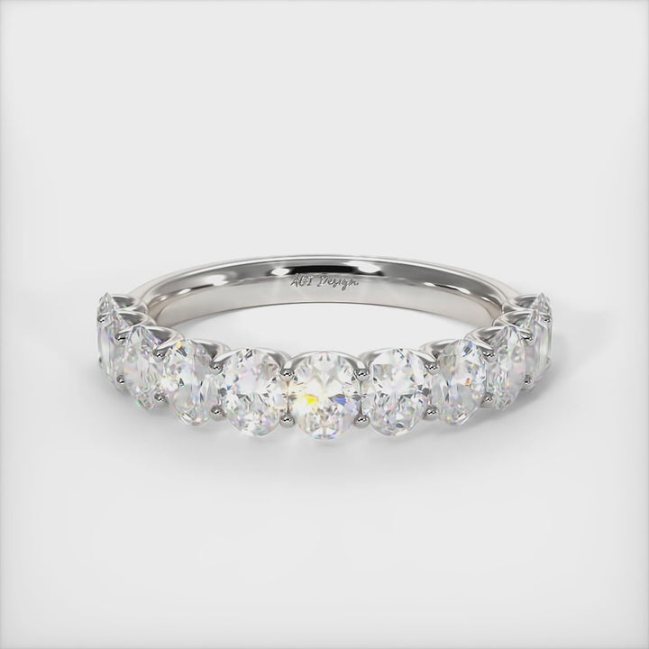 Celebrate the lasting tradition of marriage with a timeless gold or platinum wedding band set with oval high-quality lab-created diamonds. This ring will definitely impress your Loved One and will stand out on any occasion./AGI Design