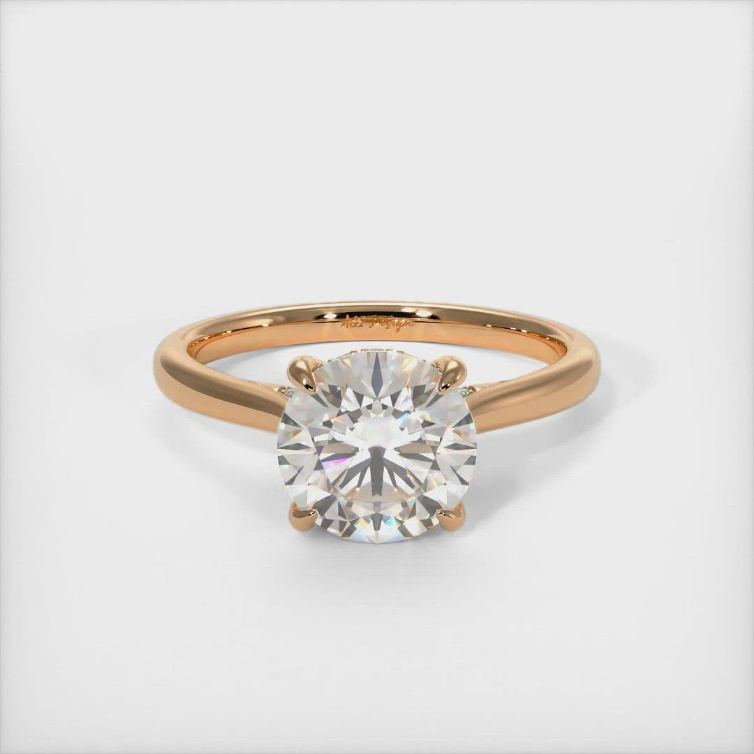 Bella round moissanite engagement ring/AGI Design  Crafted in solid gold or platinum, this intriguing design features a sparkling round cut Forever One moissanite center stone wrapped in a lab-created diamond-adorned hidden hallo frame. Sizes 1ct, 2ct, and 3ct are available for this unique solitaire ring 