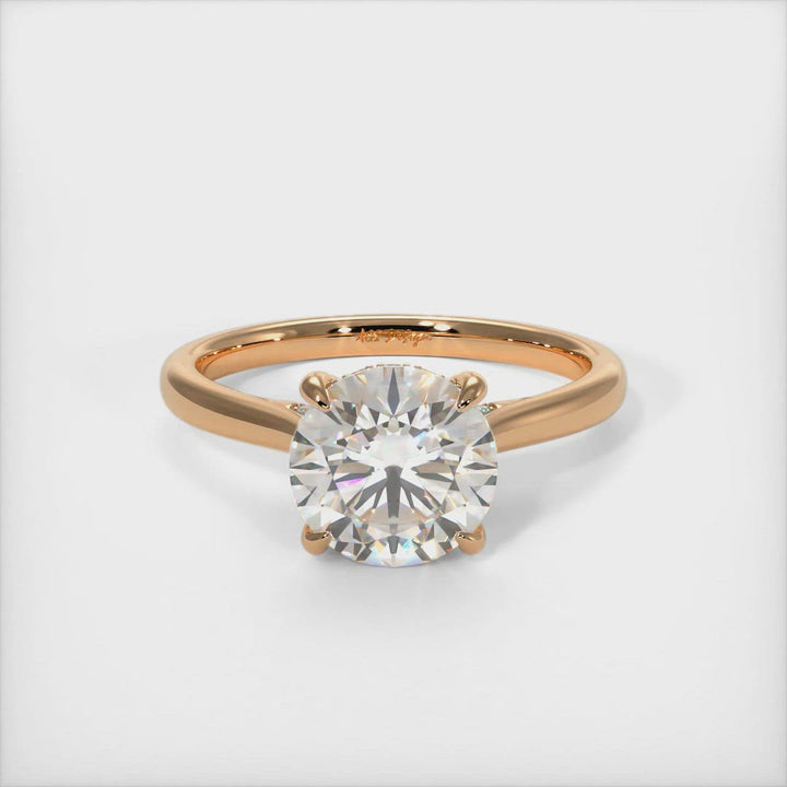 Bella round moissanite engagement ring/AGI Design  Crafted in solid gold or platinum, this intriguing design features a sparkling round cut Forever One moissanite center stone wrapped in a lab-created diamond-adorned hidden hallo frame. Sizes 1ct, 2ct, and 3ct are available for this unique solitaire ring 