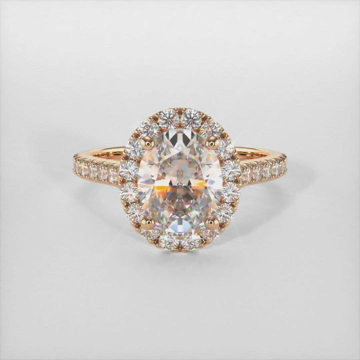 Emory oval moissanite engagement ring/AGI Design/This ring in gold or platinum has a lab-diamonds halo surrounding the center  oval moissanite, along with a small hidden or "collar" halo underneath the center to add a little detail and a unique look. The main stone is a colorless Moissanite and accent stones are Lab-Created diamonds SI-VS quality and E-F color. 