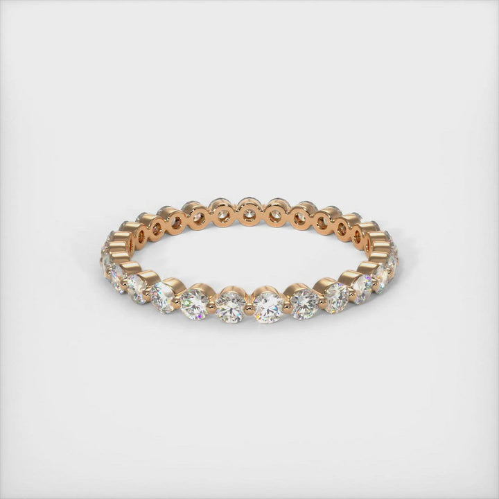This exquisite ladies diamond eternity band ring made of gold or platinum features a 2mm Lab-Created diamonds set in a unique, low-profile setting and can be used as a wedding band or anniversary ring. AGI Design