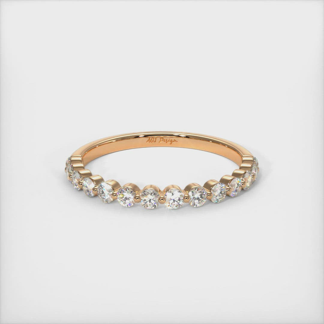 This exquisite ladies diamond semi-eternity band in gold or platinum features a 2mm Lab-Created diamonds set in a unique, low-profile setting and can be used as a wedding band or anniversary ring. AGI Design