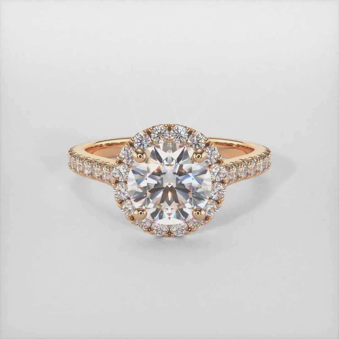 Emily round moissanite engagement ring/AGI Design/ In gold or platinum, this ring has a delicate halo surrounding the center moissanite, along with a small hidden or "collar" halo underneath the center to add a little detail and a unique look. The main stone is a Round  Colorless Moissanite and accent stones are lab-created diamonds.